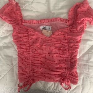Tiger Mist mesh Crop in guava pink with red sketched flower design size Medium